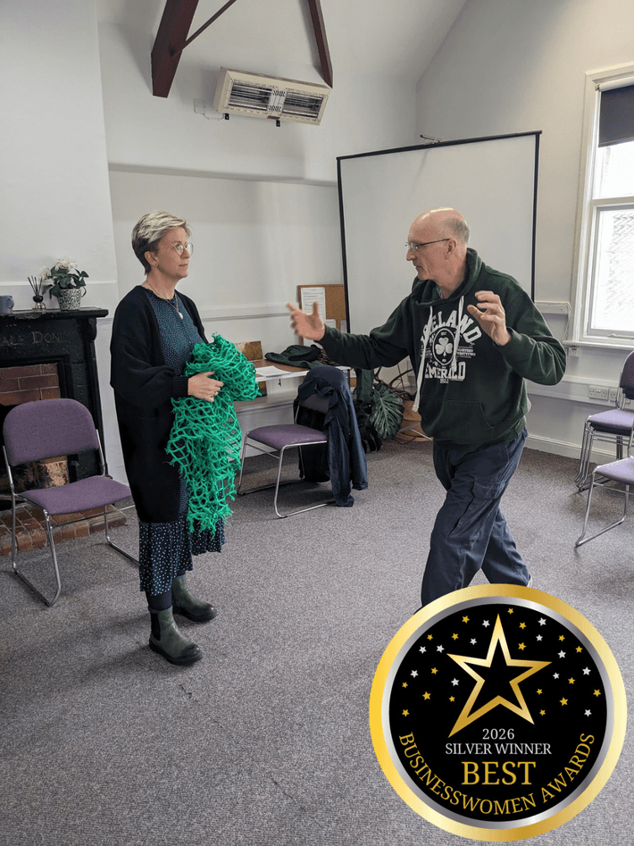Takeover hour - A male Drama Therapist demonstrating how drama therapy can help others to a female member of the community.