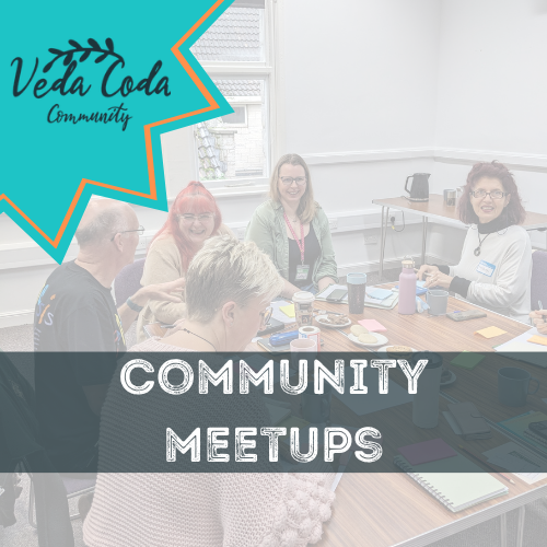 banner for community meetups with a picture of attendees around a table working.