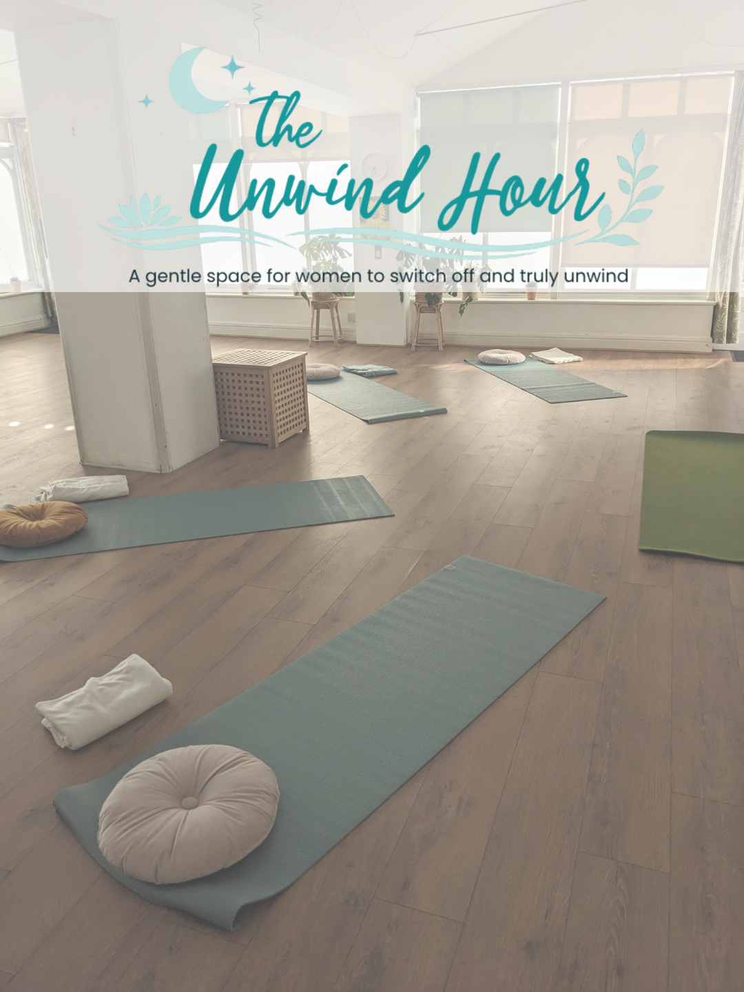 4 yoga mats laid out in a semi circle in a studio setting.